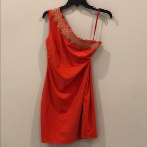 Coral one sleeve dress with flower detail